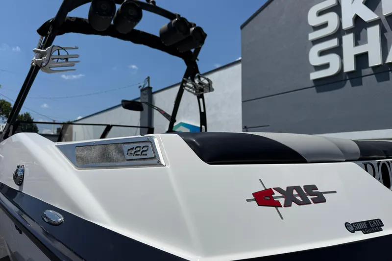 Slide: The Image of 2014 Axis A22 boat at Ski Shack, featuring sleek design and branding. - 14