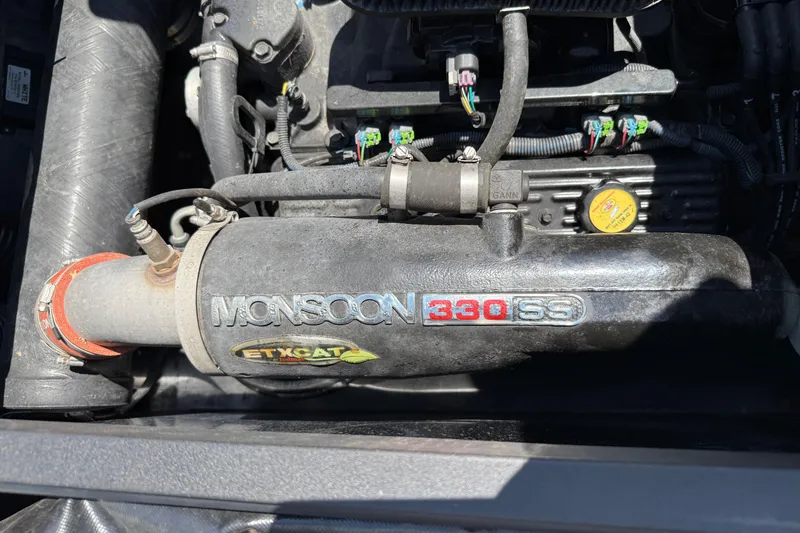 Slide: The Image of Engine of a 2014 Axis A22 boat featuring Monsoon 330 SS ETXCAT. - 35