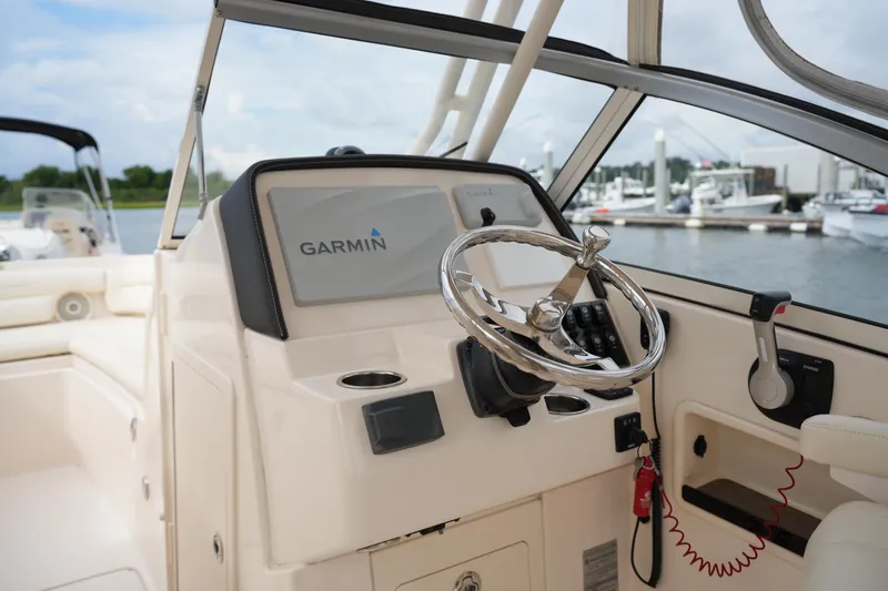 Slide: The Image of 2018 Grady-White Freedom 235 boat helm with Garmin navigation system. - 29