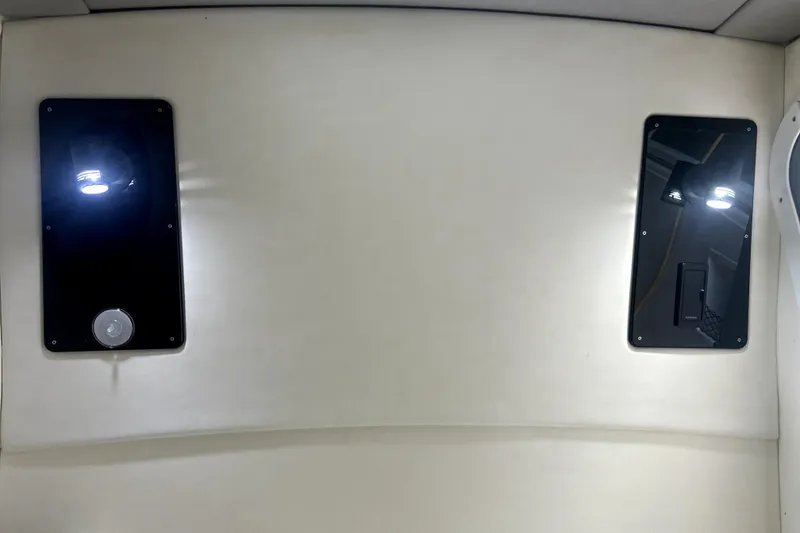 Slide: The Image of Compact sink area in 2019 Sunsation 34 CCX boat with paper towel holder. - 23