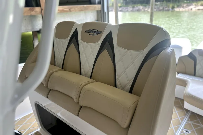 Slide: The Image of Electrical panel of 2019 Sunsation 34 CCX boat with AC voltage meter and circuit breakers. - 29