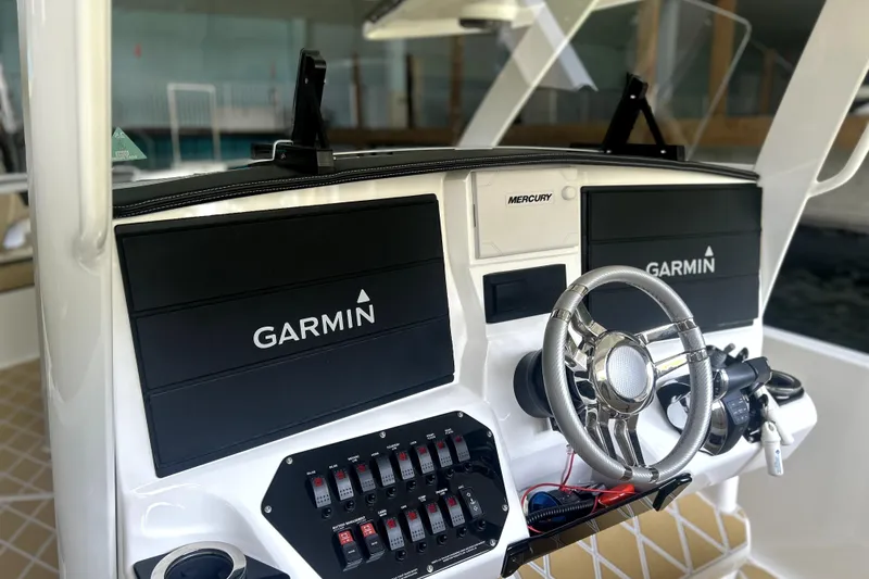 Slide: The Image of Chrome anchor windlass on 2019 Sunsation 34 CCX boat, with chain and yellow warning tag. - 30