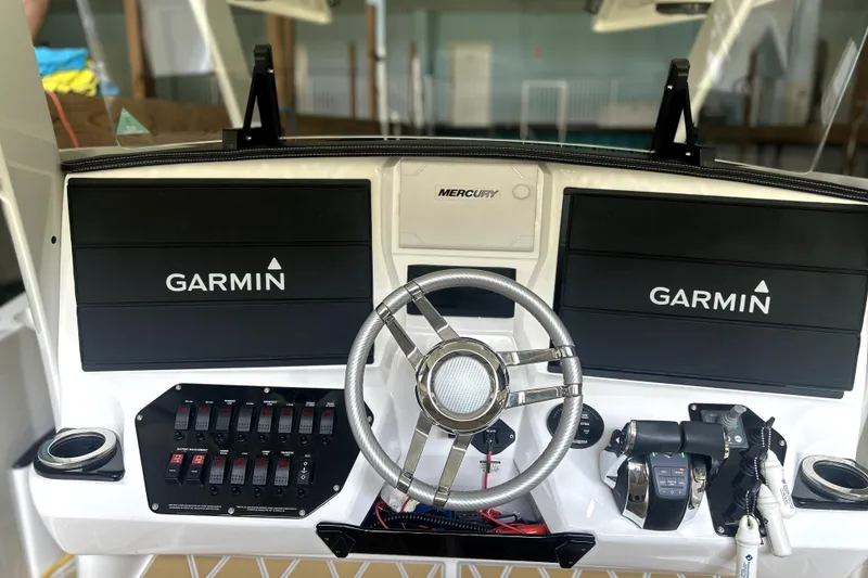 Slide: The Image of Open hatch on 2019 Sunsation 34 CCX boat, dockside view. - 31