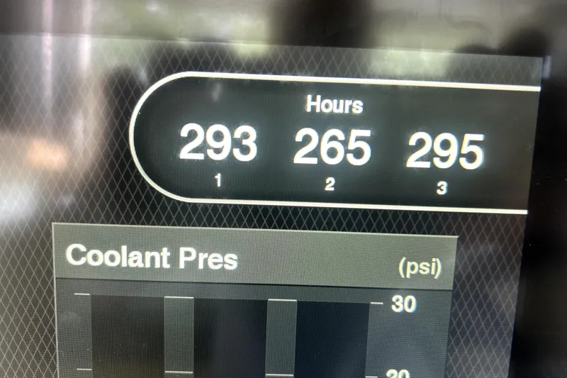 Slide: The Image of Garmin navigation display on 2019 Sunsation 34 CCX boat, showing coastal map and data. - 38