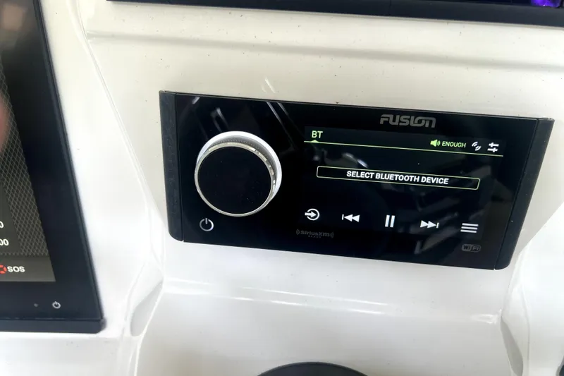 Slide: The Image of 2019 Sunsation 34 CCX boat interior with clear windshield and modern design. - 40