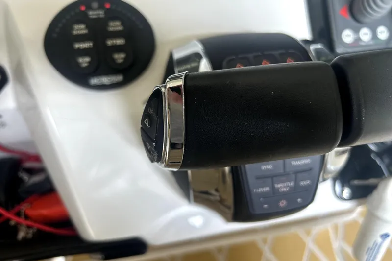 Slide: The Image of 2019 Sunsation 34 CCX boat interior with dashboard and windshield details. - 41