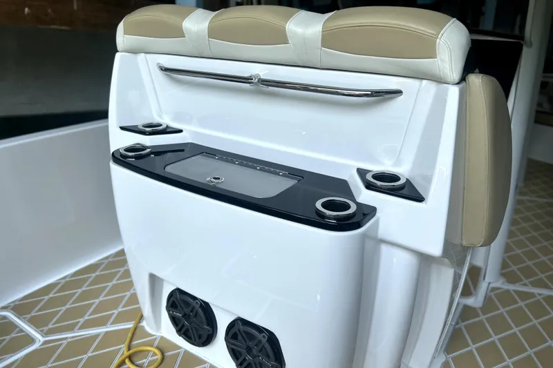 Slide: The Image of Close-up of 2019 Sunsation 34 CCX boat throttle controls and dashboard. - 45