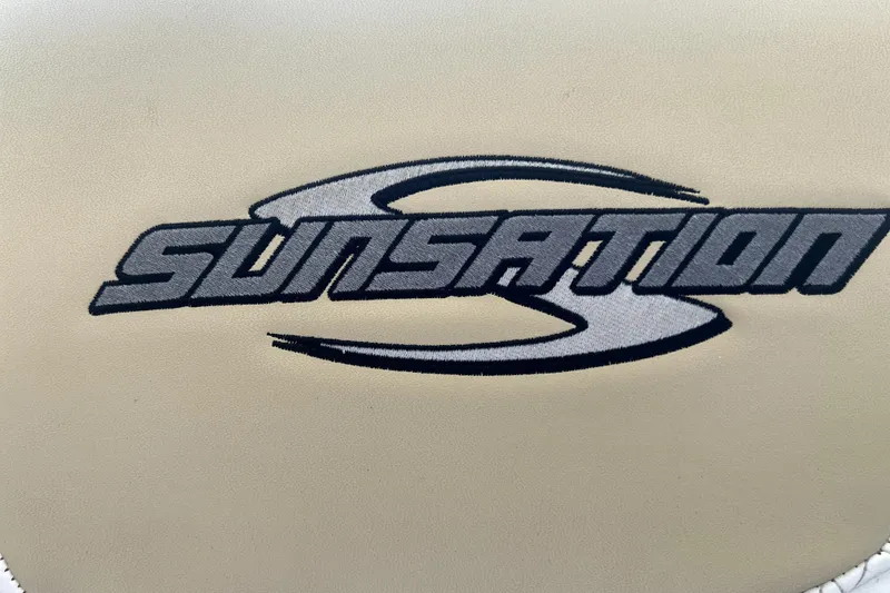 Slide: The Image of Logo of 2019 Sunsation 34 CCX boat on beige background. - 53