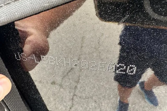 Slide: The Image of Close-up of a 2020 Lund 1775 Adventure Sport hull identification number. - 18