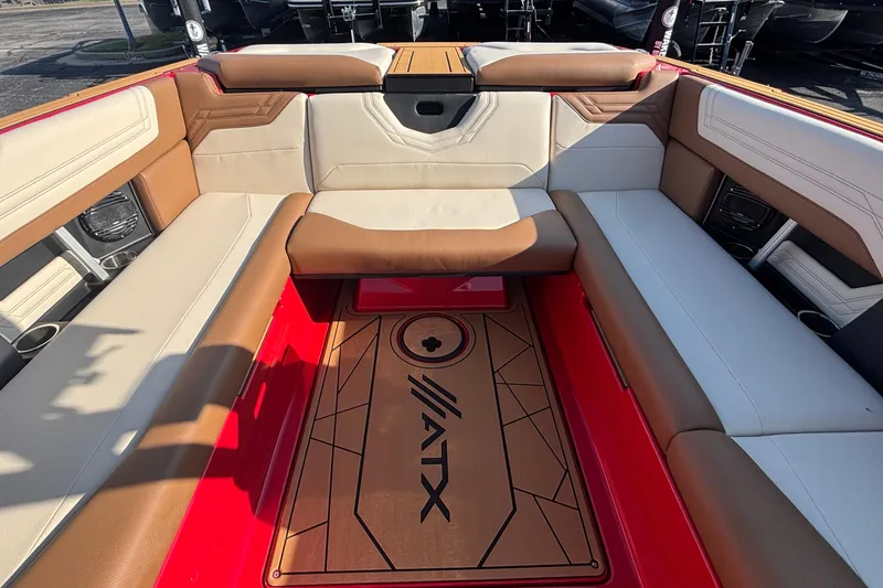 Slide: The Image of 2026 ATX Surf Boats 24 Type-S interior with red and tan seating, stylish design. - 11