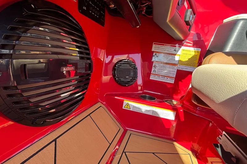 Slide: The Image of Interior of 2026 ATX Surf Boats 24 Type-S with red finish and audio system. - 17