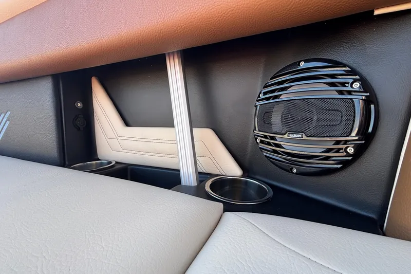 Slide: The Image of 2026 ATX Surf Boats 24 Type-S interior with speaker and cup holders. - 22