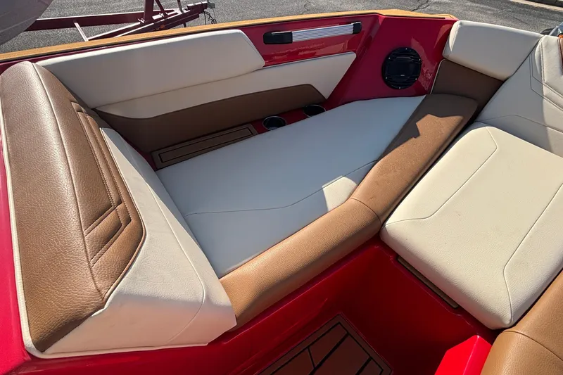 Slide: The Image of 2026 ATX Surf Boats 24 Type-S interior with brown and white seating. - 28