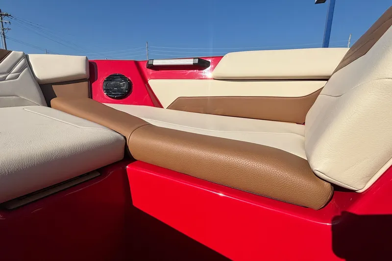 Slide: The Image of 2026 ATX Surf Boats 24 Type-S interior with red, beige, and brown seating. - 30