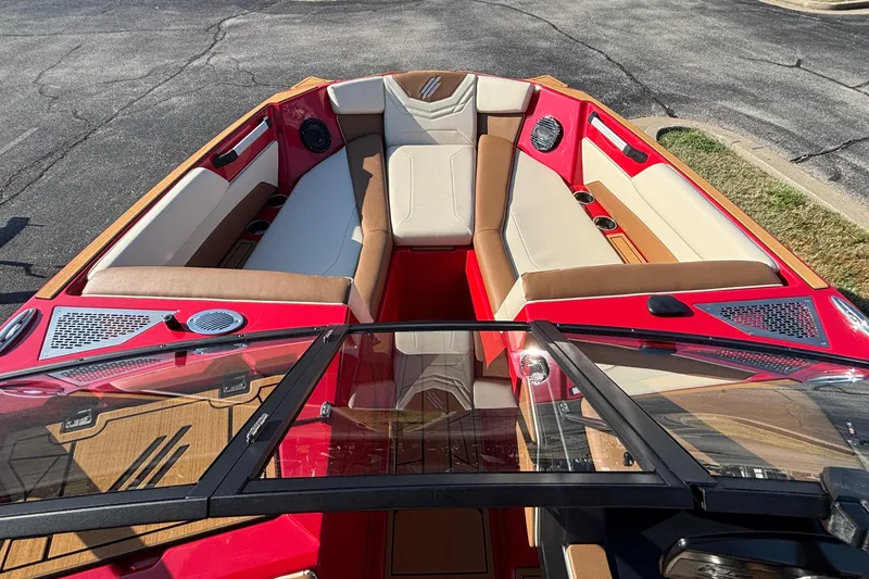 Slide: The Image of 2026 ATX Surf Boats 24 Type-S interior with red and beige seating, sleek design. - 8