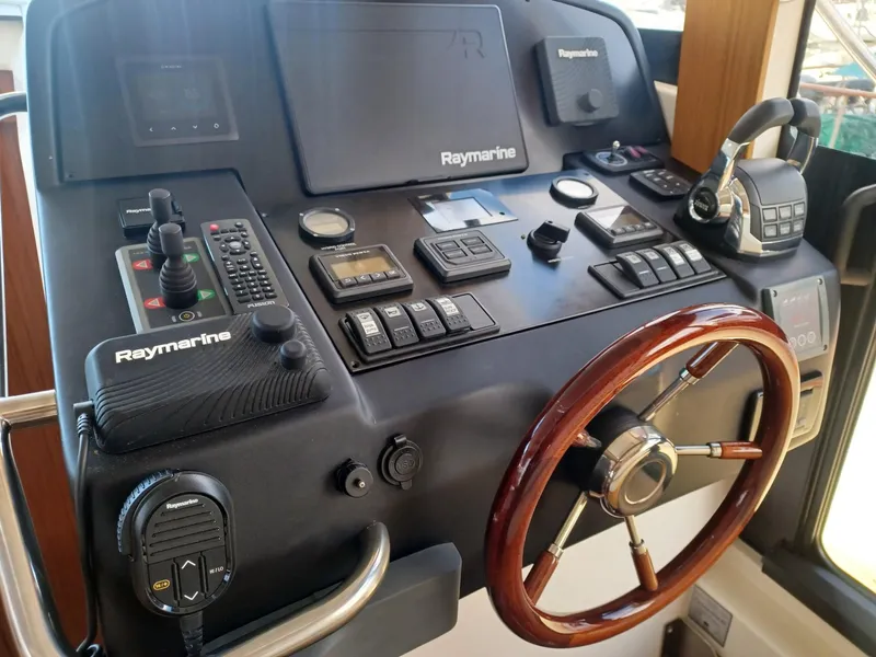Slide: The Image of Control panel of a 2020 Greenline 40 yacht with Raymarine navigation equipment. - 6