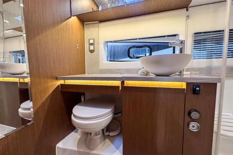 Slide: The Image of Modern bathroom interior of 2022 Jeanneau Leader 12.5 WA yacht, featuring sleek design and amenities. - 31
