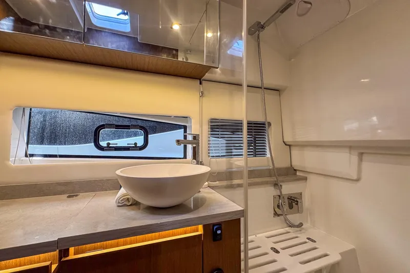 Slide: The Image of Modern bathroom interior of 2022 Jeanneau Leader 12.5 WA yacht with sleek fixtures. - 32