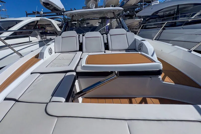 Slide: The Image of 2022 Jeanneau Leader 12.5 WA boat with luxurious seating and sleek design. - 38