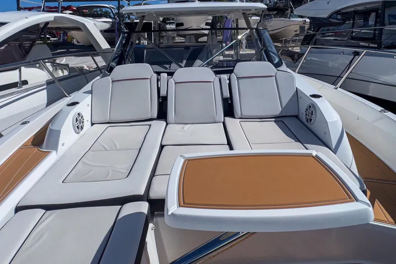 Slide: The Image of Luxurious seating area on 2022 Jeanneau Leader 12.5 WA boat, featuring comfortable cushions and sleek design. - 39