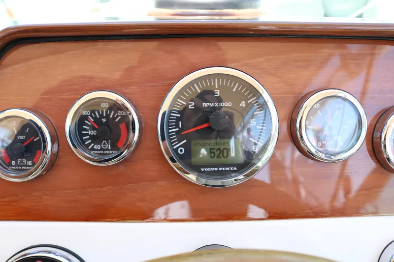 Slide: The Image of Interior of a 2013 Hunt Harrier boat with wooden cabinetry and seating. - 18