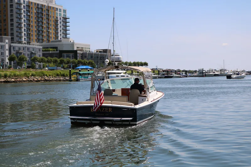 Slide: The Image of Boat cruising in marina, 2013 Hunt Harrier model, cityscape background, clear sky. - 37