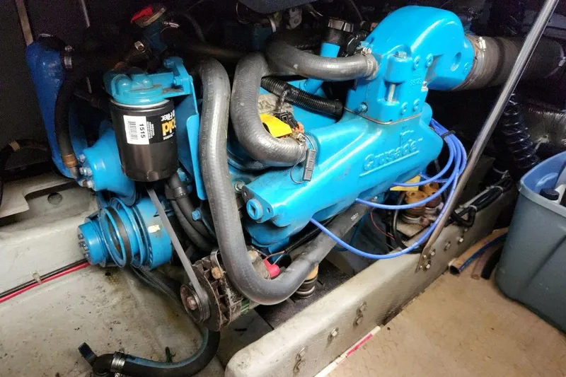 Slide: The Image of Engine compartment of a 1997 Silverton 402 Motor Yacht with Crusader engine. - 34