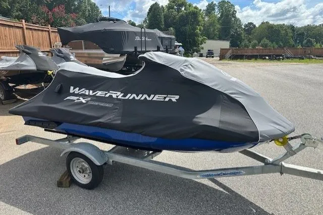 Slide: The Image of 2020 Yamaha WaveRunner FX Cruiser SVHO covered on trailer in outdoor setting. - 1