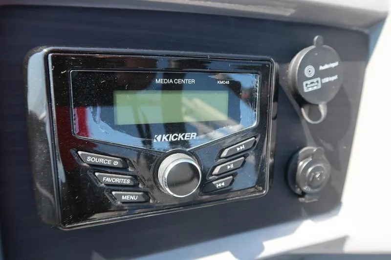 Slide: The Image of Kicker media center on 2021 Bennington 21 LL boat dashboard. - 12