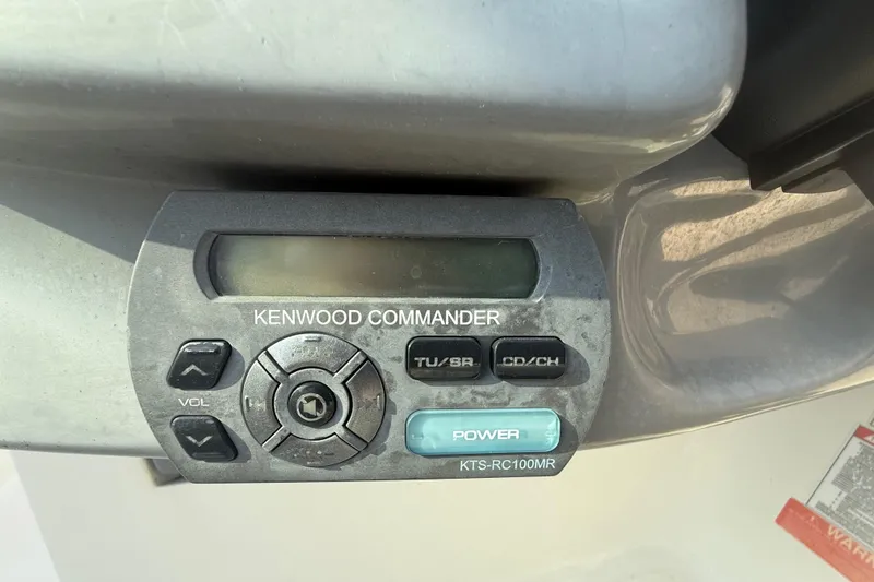 Slide: The Image of Kenwood Commander audio control panel on 2008 Monterey 254FS boat. - 19