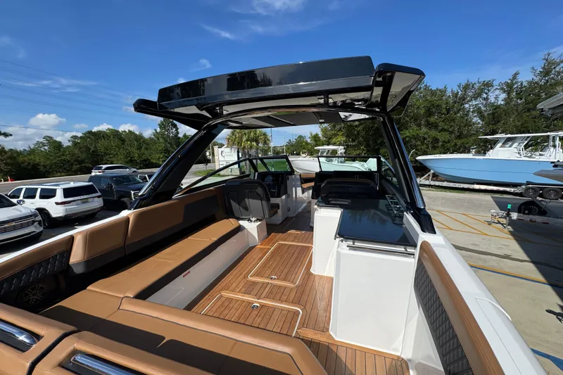 Slide: The Image of 2024 Cobalt R33 boat interior with sleek design, spacious seating, and modern amenities. - 40