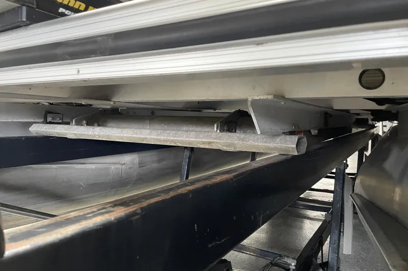 Slide: The Image of 2018 Crestliner FS 220 boat underside on trailer, showcasing structural details. - 5