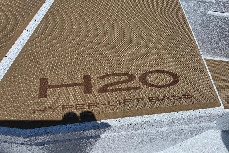 Slide: The Image of 2026 Xpress H20 Bass boat deck with "Hyper-Lift Bass" branding. - 19