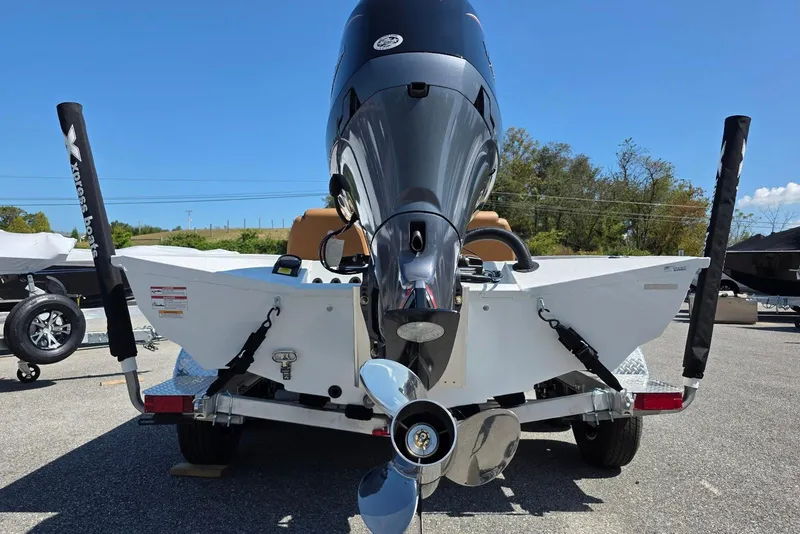 Slide: The Image of 2026 Xpress H20 Bass boat rear view with powerful outboard motor. - 9