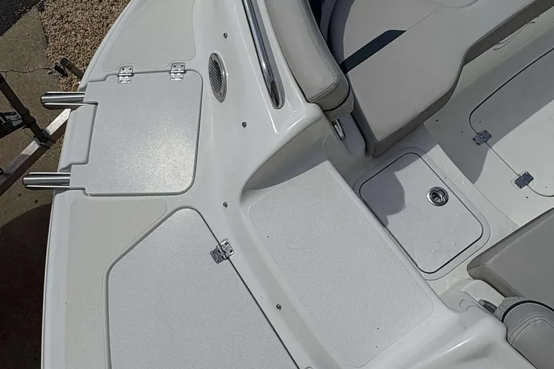 Slide: The Image of 2023 Hurricane SD 2400 boat interior with seating and storage compartments. - 13