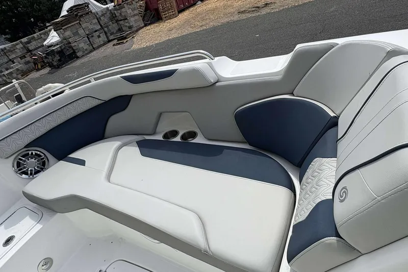Slide: The Image of 2023 Hurricane SD 2400 boat interior with stylish seating and speaker system. - 5