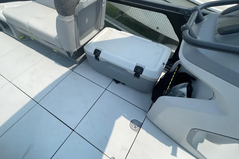 Slide: The Image of 2023 Sea-Doo Switch 21-230 interior with seating and storage area. - 8