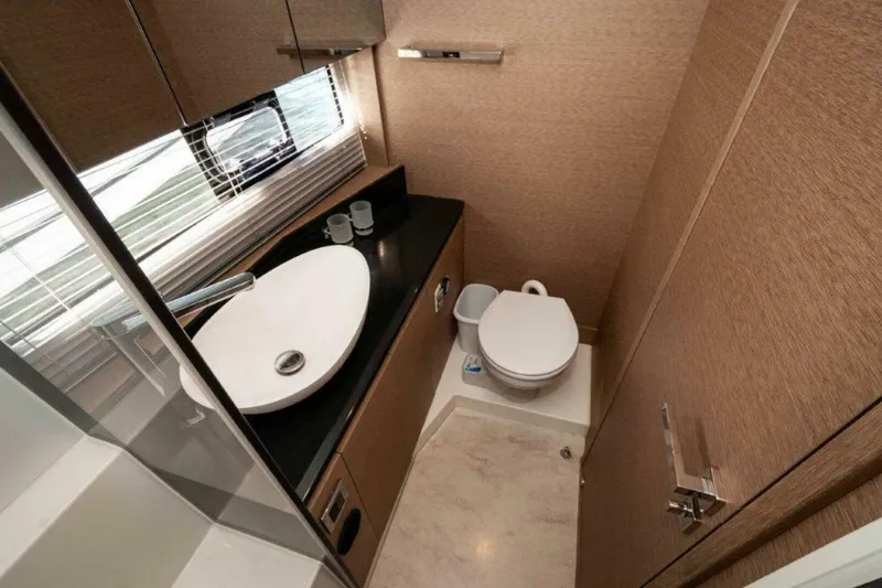 Slide: The Image of 2017 Prestige 460 Flybridge- "Can't Anchor Us"- Master Head - 15