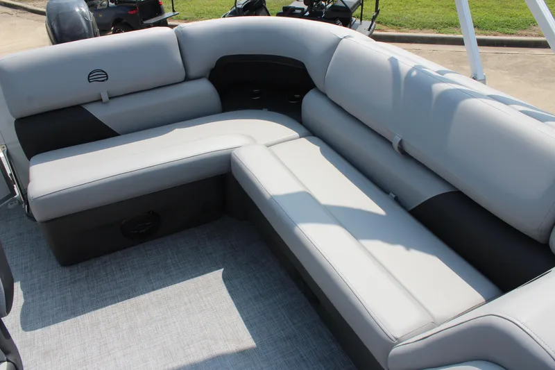 Slide: The Image of 2026 Sun Tracker Party Barge 20 DLX with spacious gray seating and modern design. - 14