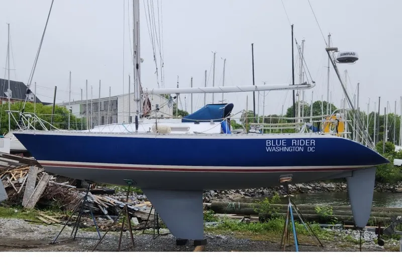 The Image of Blue sailboat "Blue Rider" on land, Peacock 35 model, 1984, Washington DC. - 1