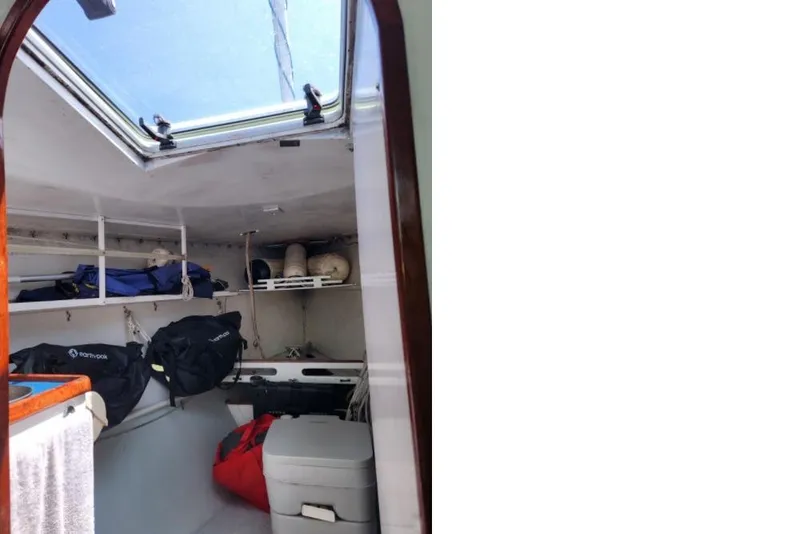 Slide: The Image of Interior of 1984 Peacock 35 sailboat with storage and skylight. - 10