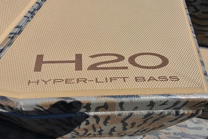 Slide: The Image of 2026 Xpress H20 Bass boat deck with "Hyper-Lift Bass" branding. - 19