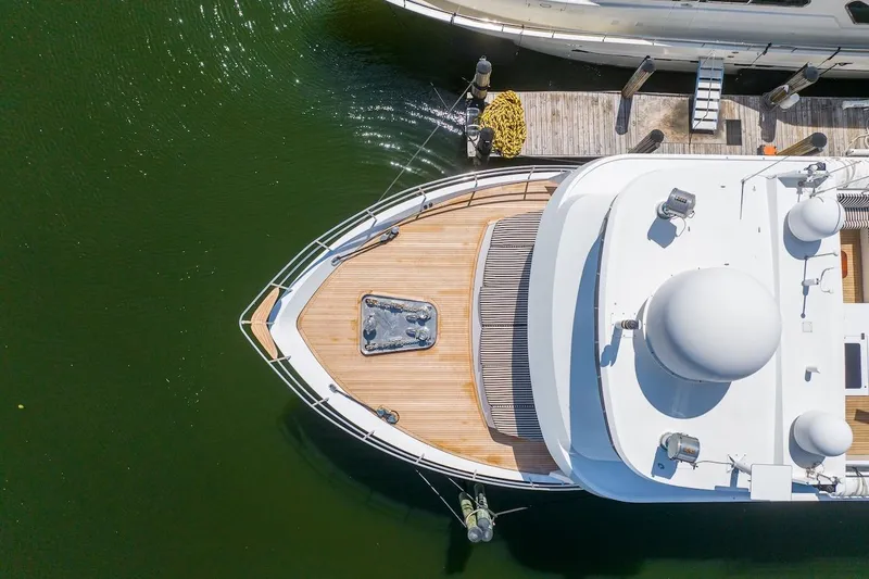 Slide: The Image of Aerial view of 1996 ABD 90 Explorer yacht docked at marina. - 10