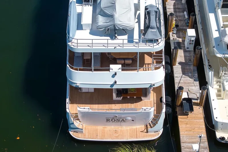 Slide: The Image of Aerial view of 1996 ABD 90 Explorer yacht docked at marina. - 14
