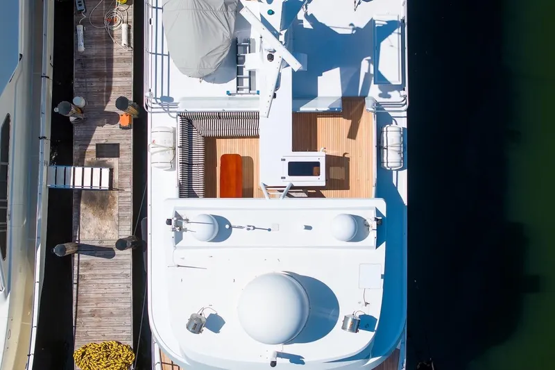 Slide: The Image of Aerial view of 1996 ABD 90 Explorer yacht docked at a marina. - 19