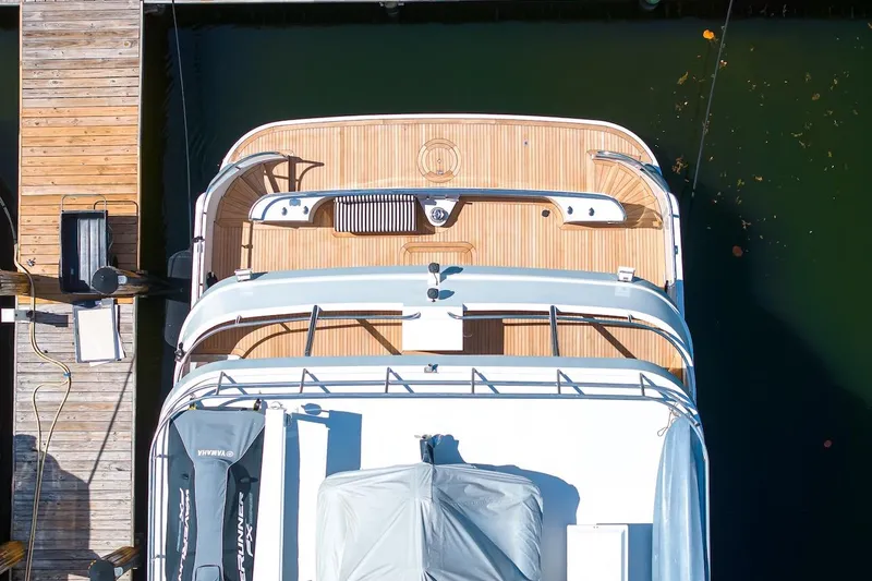 Slide: The Image of Overhead view of 1996 ABD 90 Explorer yacht docked at a wooden pier. - 21