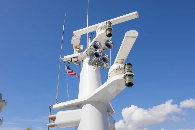 Slide: The Image of Radar and communication equipment on ABD 90 Explorer yacht, 1996, with American flag. - 26