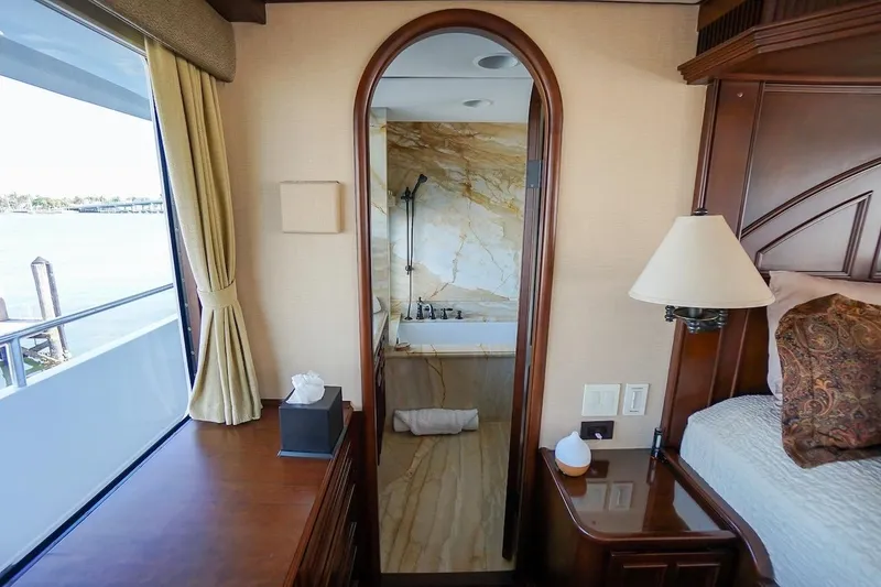 Slide: The Image of Luxurious 1996 ABD 90 Explorer yacht interior with elegant bedroom and marble bathroom. - 57