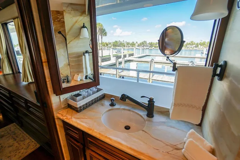 Slide: The Image of Luxurious bathroom in 1996 ABD 90 Explorer yacht with marina view. - 59