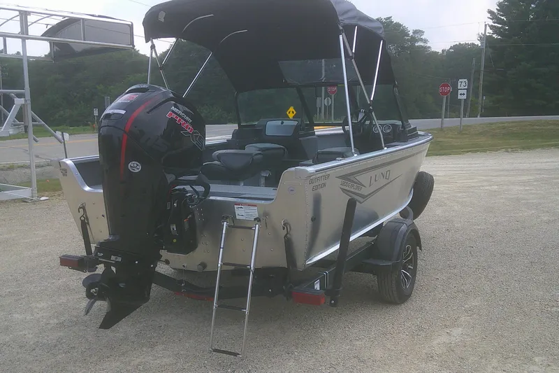 Slide: The Image of 2026 Lund 1800 Explorer Sport boat with Mercury engine on trailer. - 4